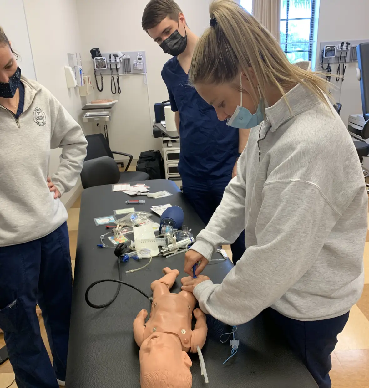 Training with infant medical mannequin